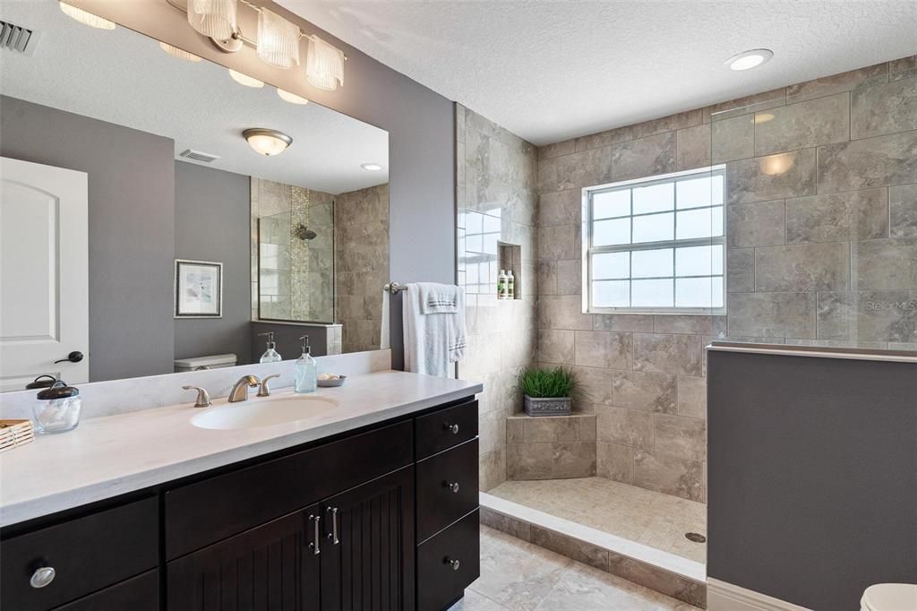 Completely Remodeled Fourth Bathroom with Large Vanity and Walk-in Shower