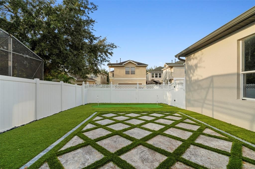 Backyard with synthetic sod