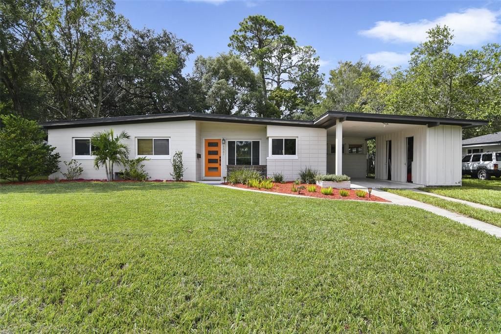 Mid century modern charm and a renovated 3BD/2BA HOME with a NEW ROOF (2021), UPDATED ELECTRICAL (2021), WATER HEATER (2021), WOOD DECK/GAZEBO w/ SOLAR LIGHTS (2022), NEW WOOD LOOKS TILE FLOORS (2022), SOLAR PANELS to keep energy costs low and a BRAND NEW FRONT DOOR (2024)!