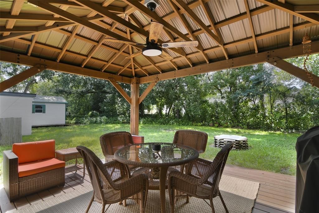 Host family cookouts or gather with friends in the expansive backyard, there is a newer deck and gazebo outfitted with solar lighting, a large shed for storage and you can sit around the fire pit and roast marshmallows under the stars.