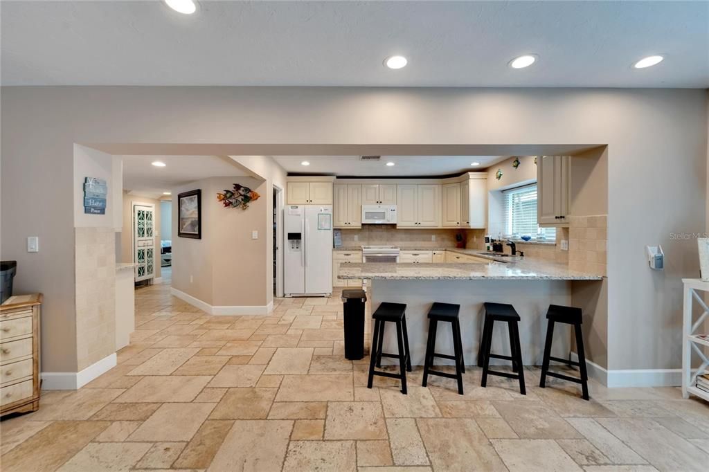 Massive kitchen with oversized breakfast bar