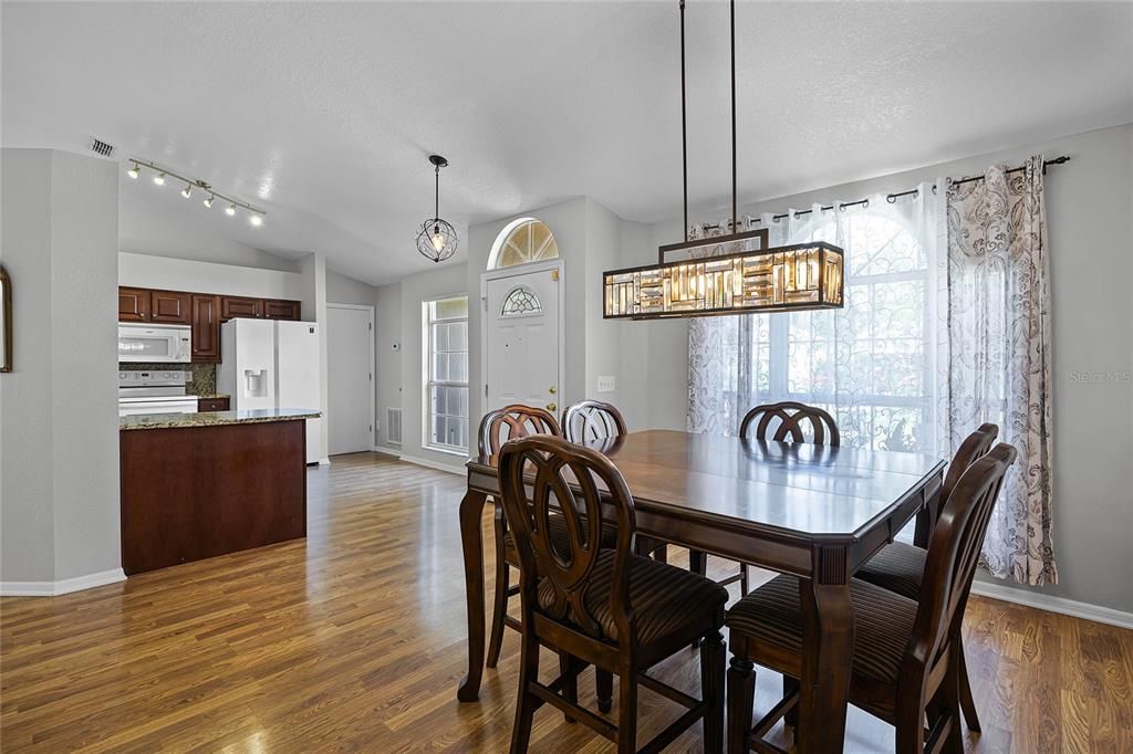 Formal dining area and kitchen entrance