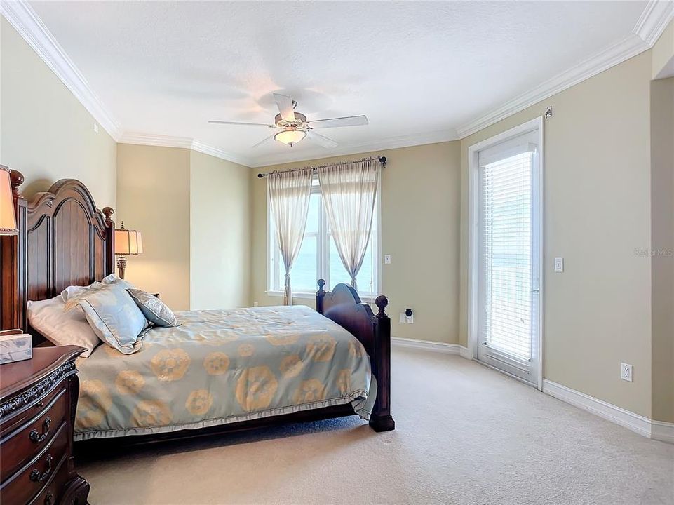 main bedroom overlooks the ocean, door to balcony