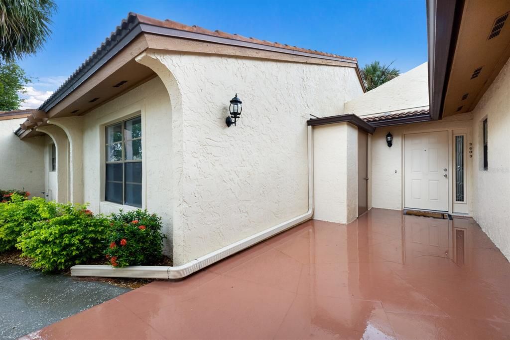 Tucked away, private front door with storage closet