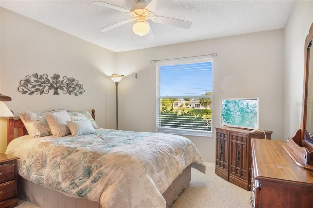 Rear guest bedroom with pond view.