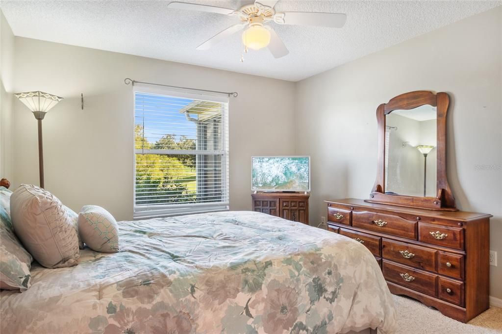 Rear guest bedroom with pond view.