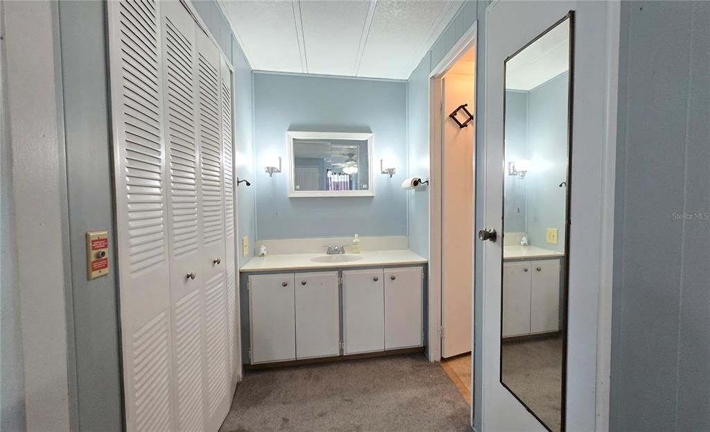 Note the security button to the left of the double closets.