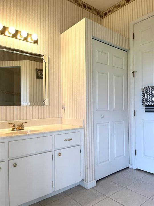 GUEST BATHROOM VIEW OF LINEN CLOSET