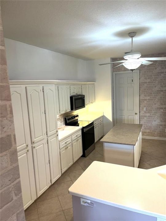 KITCHEN VIEW WITH PANTRY