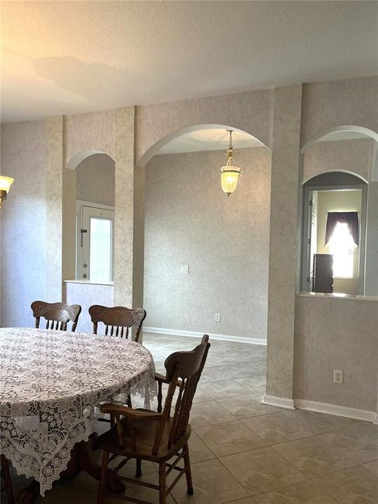 DINING ROOM VIEW TO FOYER