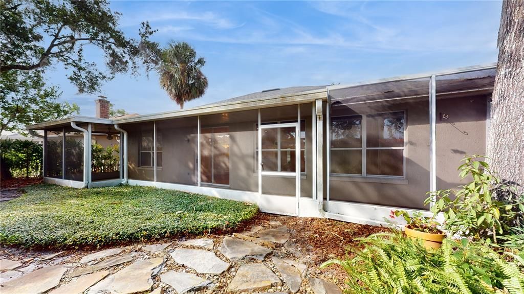 VIEWS OF SCREENED PORCH FROM BACKYARD