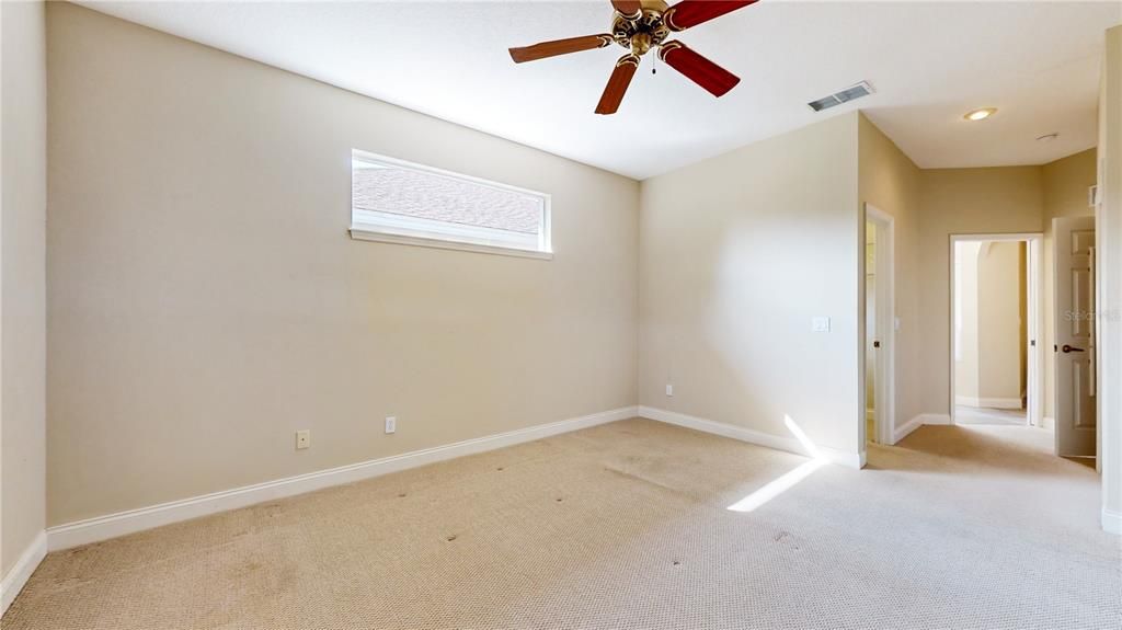 PRIMARY BEDROOM WITH WALK IN CLOSET