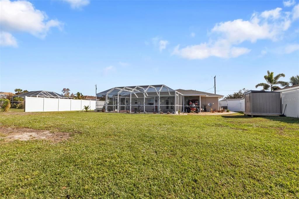 Privacy fence on the each side of the house and chain link in the back.