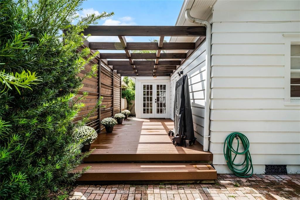 Side porch off of primary, and office/flex space