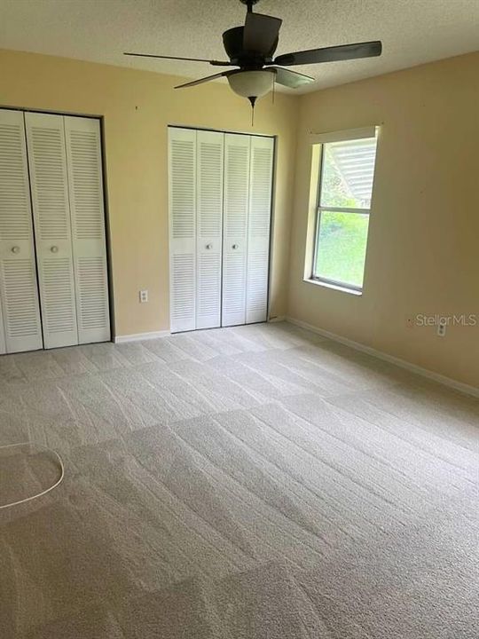 master bedroom with two closets