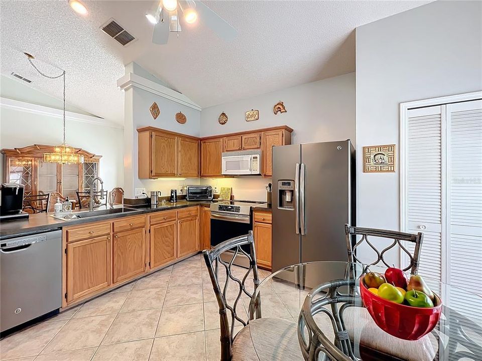 Kitchen looks through to Dining Room