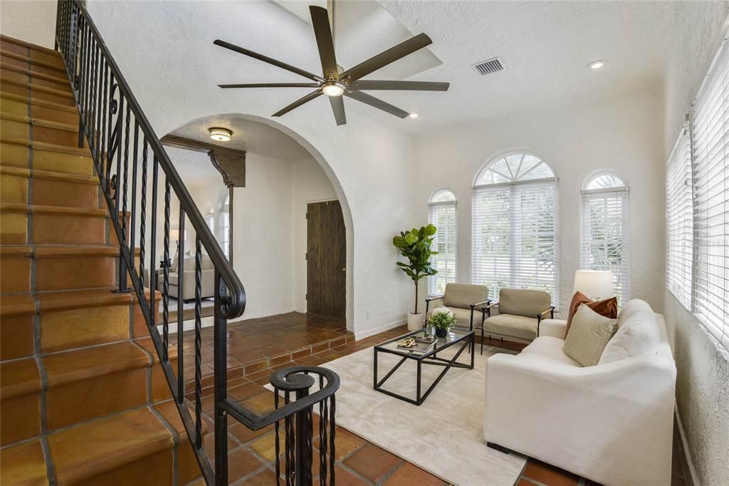 Living Room w/ Staircase to Primary