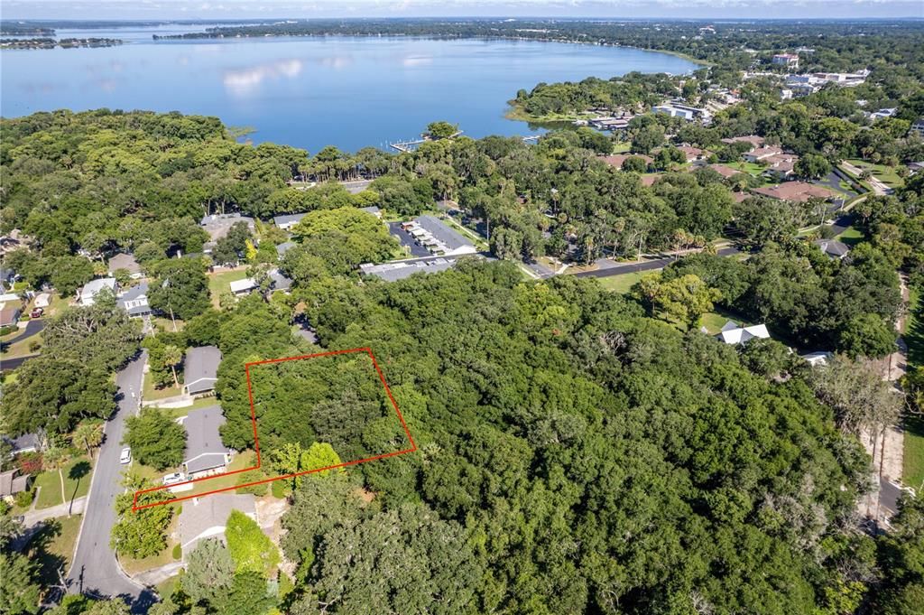 Tucked away prime location buildable lot and short walk to Lake Dora