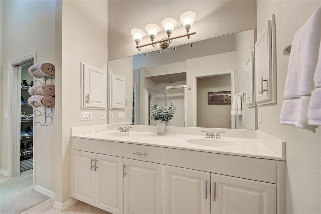 Dual sinks are a plus, no crowding in this bathroom.