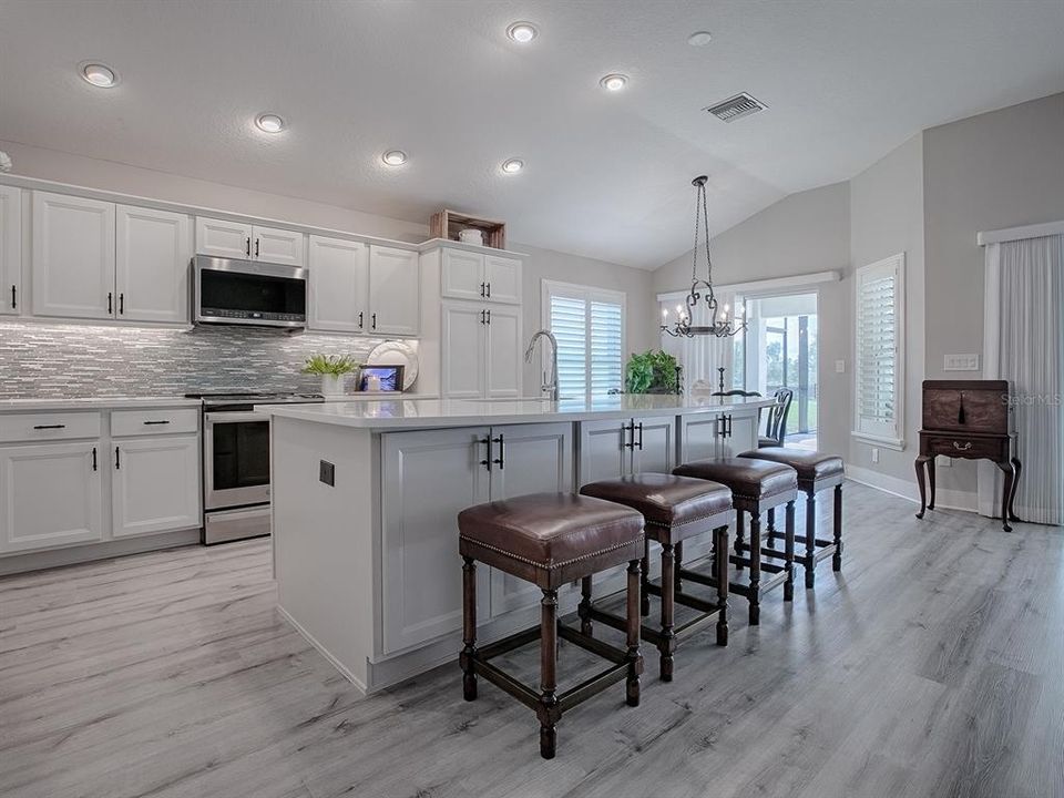 THIS MODERN KITCHEN IS THE HEART OF THE HOME! LOTS OF STORAGE EVEN IN THE ISLAND.