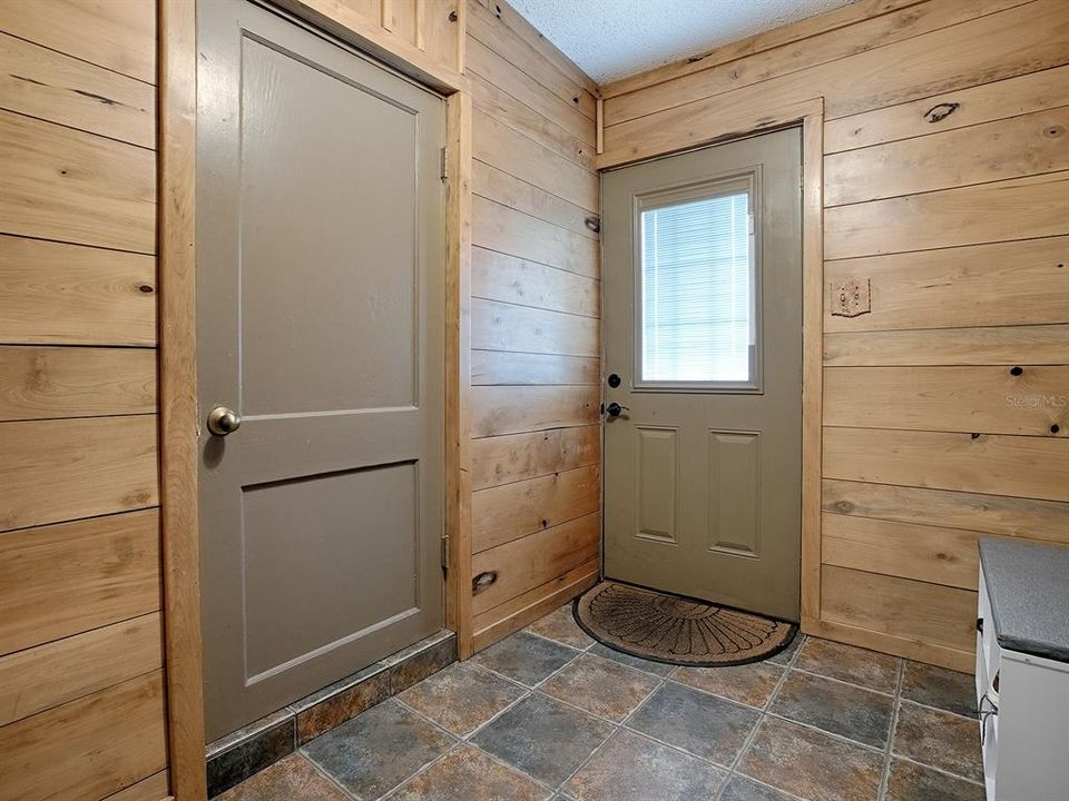 Side Entrance to Home and Indoor Laundry Room