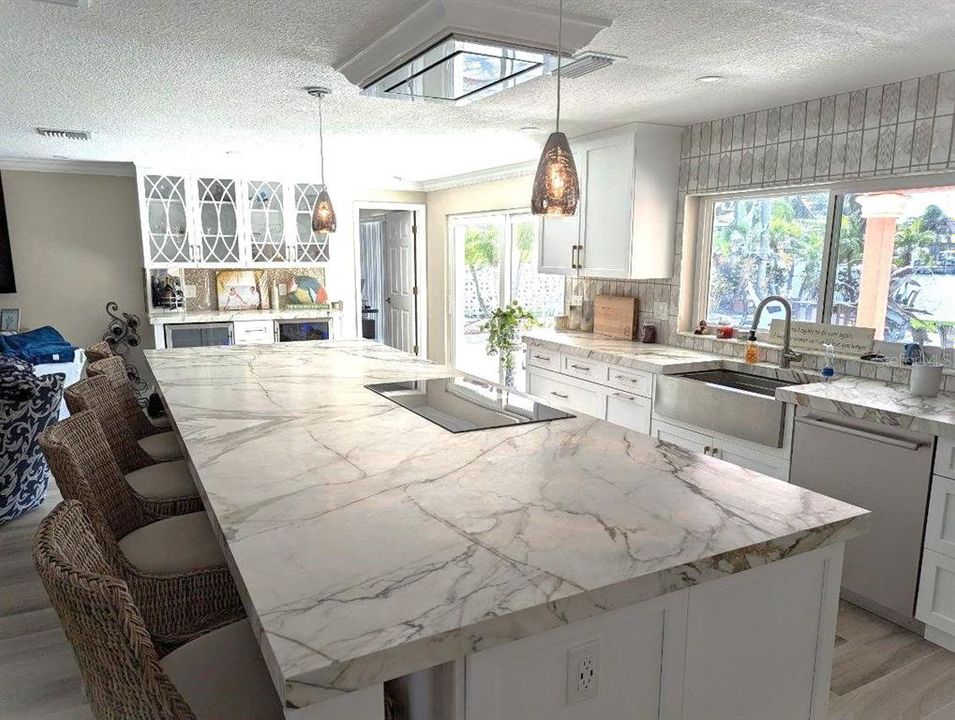 Pre Helene - Kitchen Island, sink overlooking pool and intracoastal