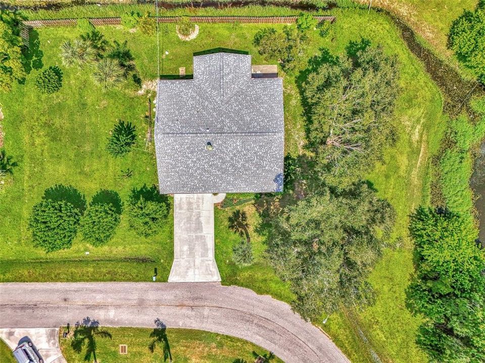 AERIAL VIEW OF HOME AND VACANT LOT  (LEFT) FOR HOME ADDITION