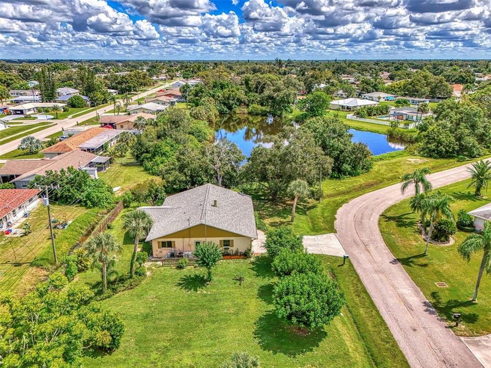 VACANT LAND HOMESITE IN FRONT OF PHOTO W/RANCH HOME IN CENTER