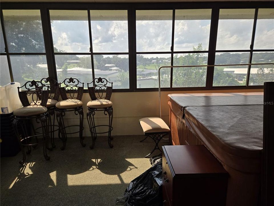 bonus / sunroom off primary bedroom