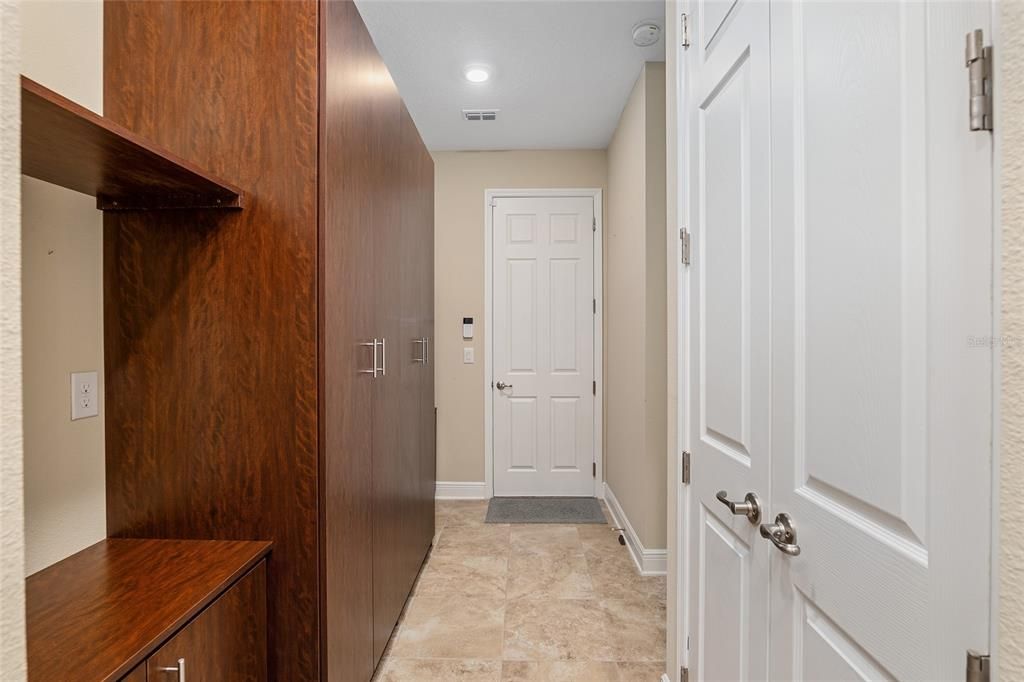 View from the pantry and kitchen to the door to the garage