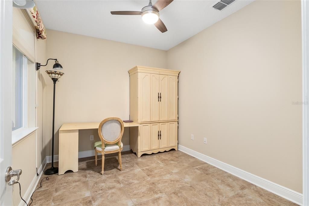 This room overlooks the screened porch