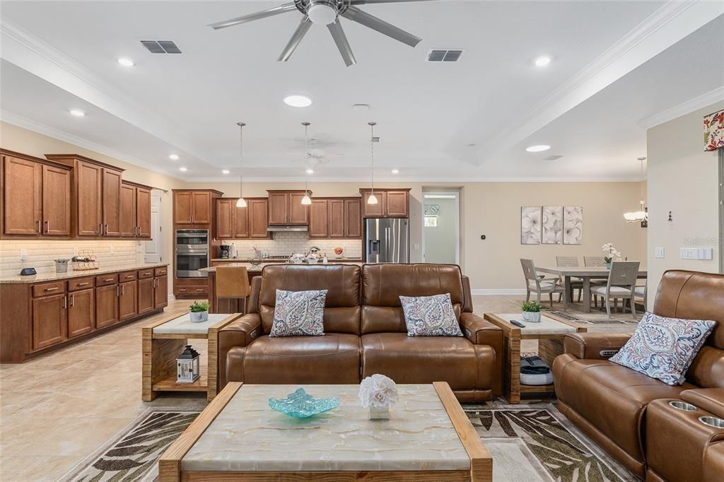 Modern ceiling fan, tray ceiling and two solar tubes that are also night lights