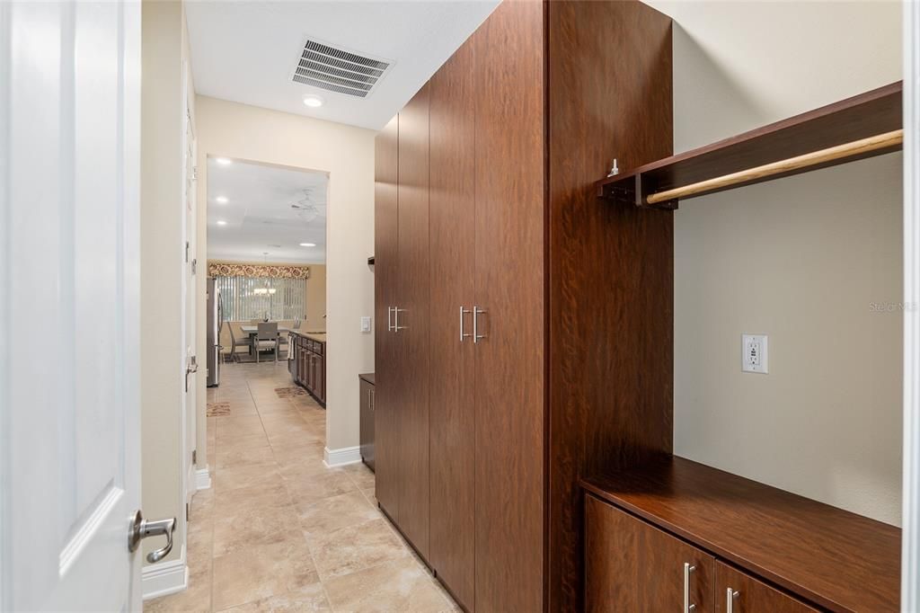 Mud room from the garage into the kitchen with built in storage