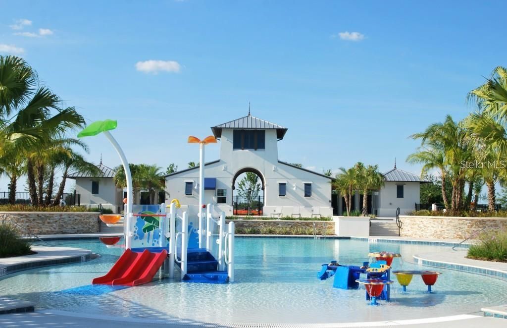 Community Center with an adult heated pool and a separate pool with play area in pool