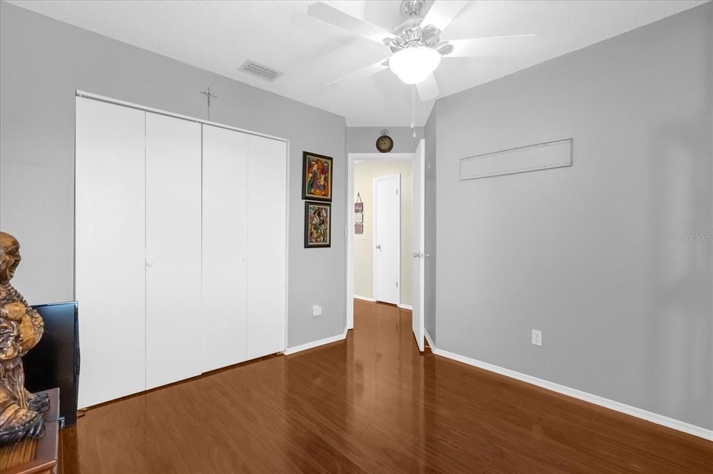 Bedroom #2- Built in closet, laminate flooring