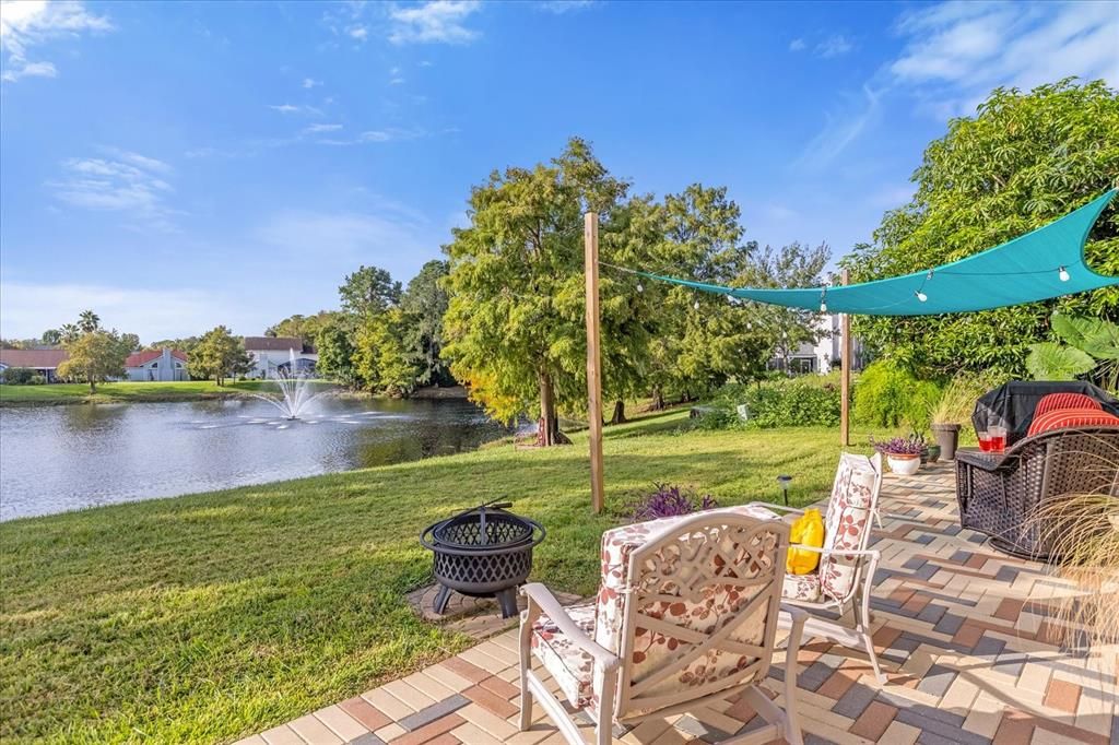 Serene Backyard- Water View with Fountain, Covered patio, Brick Pavers, great for BBQ and relaxation