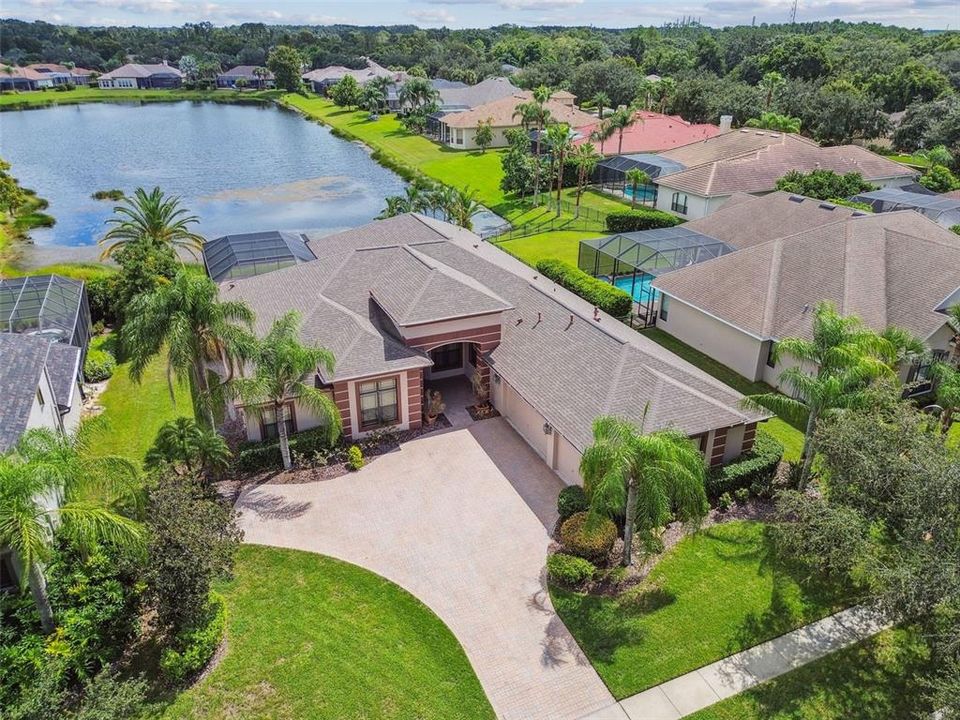 Waterfront pool home, 3,960 SF, 4/4.5/3 with den & bonus room!