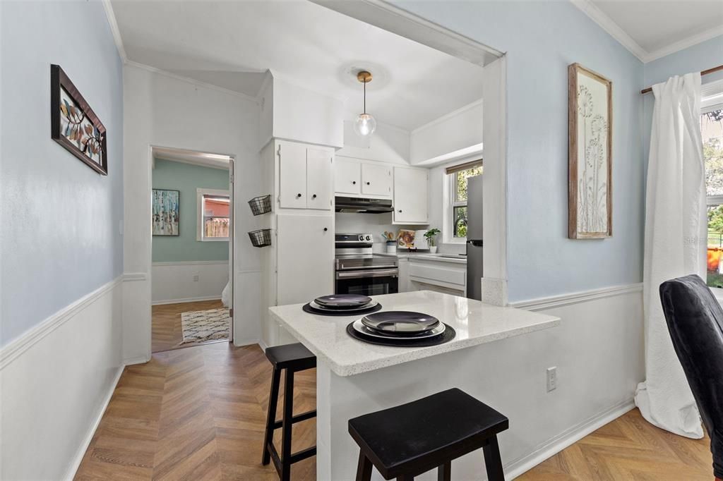 Eat-in kitchen bar with stools.