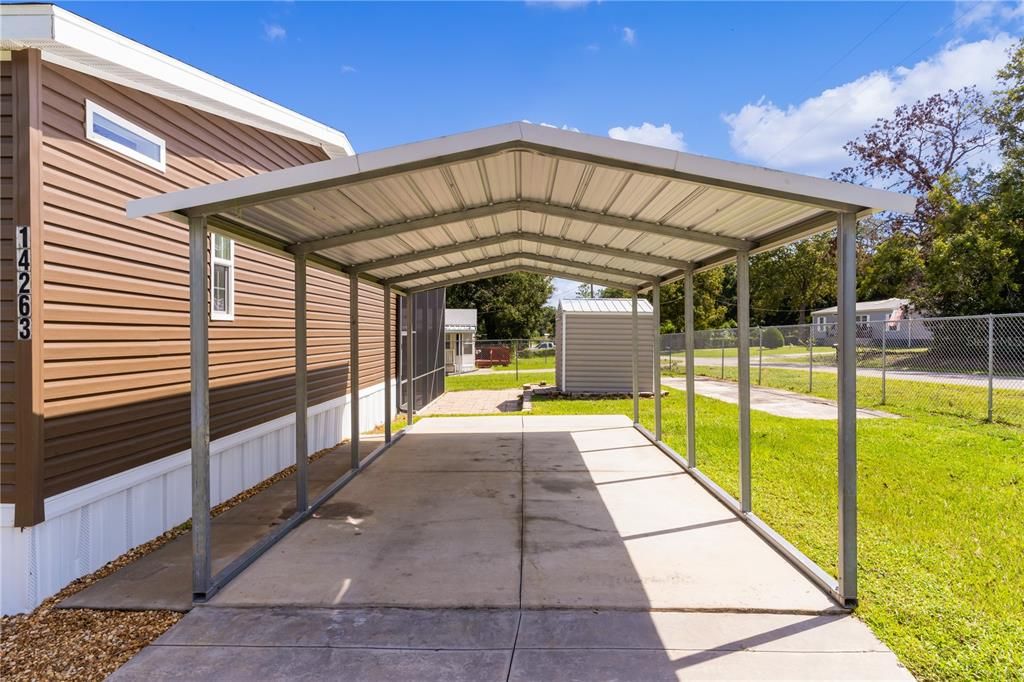 Oversized 1 car carport.