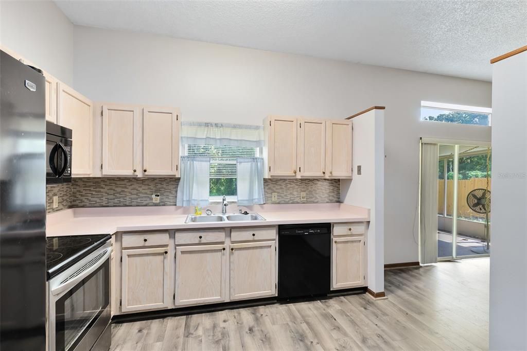 A lovely tile backsplash adds a modern flair.