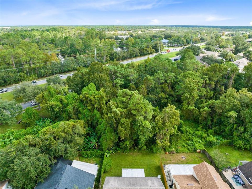 The property backs up to a wooded area, providing exceptional privacy.