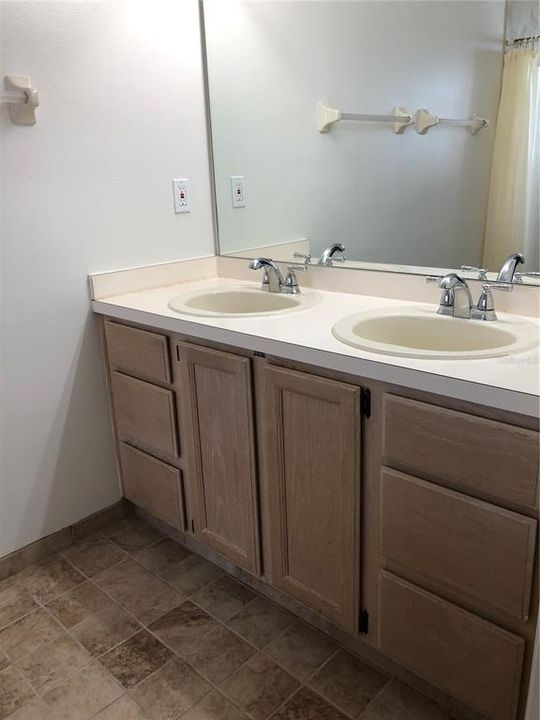 Primary Bathroom features Double Sinks.