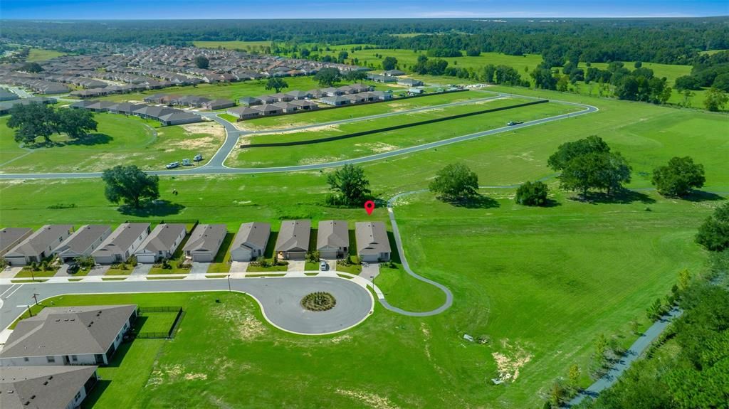 Aerial view of home and premium lot