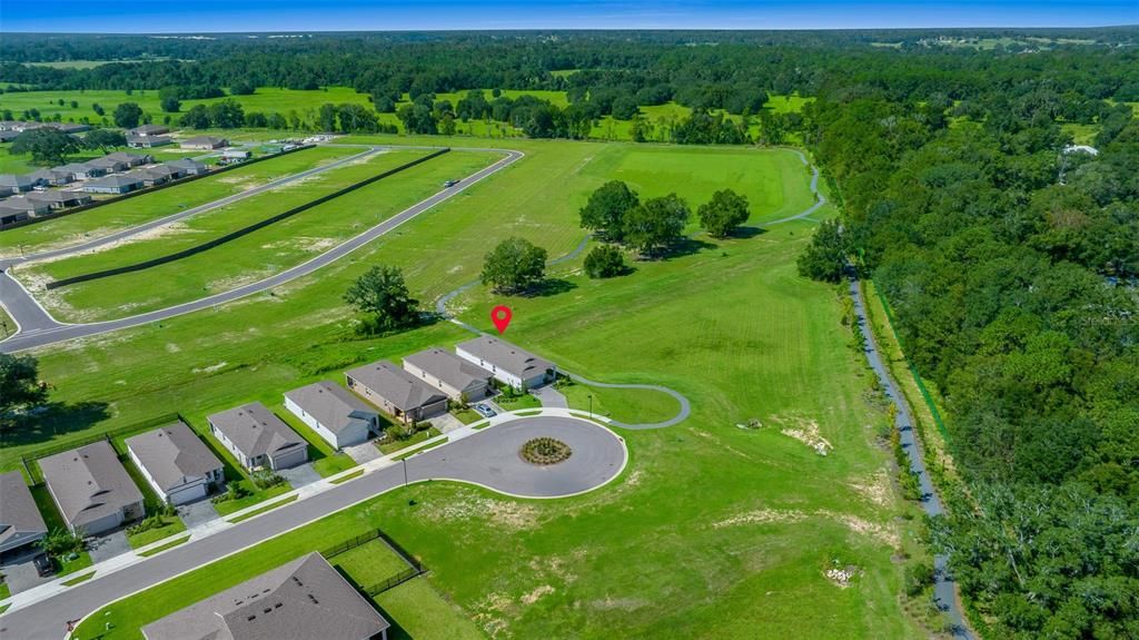 Aerial view of home and premium lot