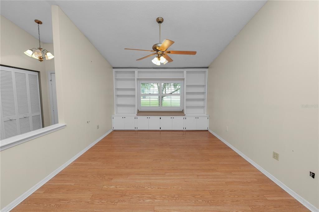 Huge Dining Room with Built In Shelving & Bay Window Seat.