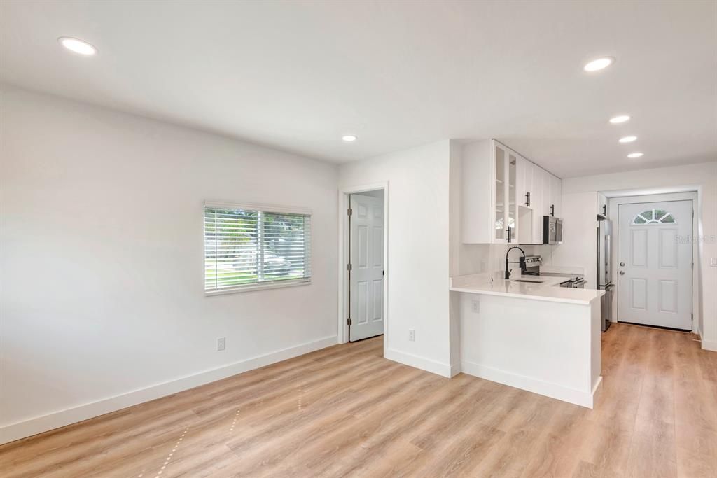 Living area looking into kitchen