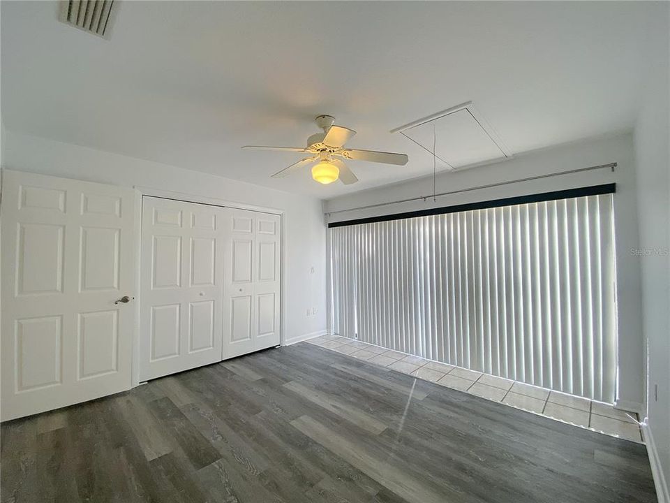 Guest bedroom also features sliding doors