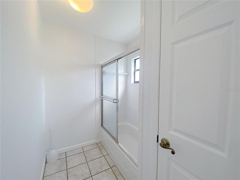 Tub/shower combo and linen closet