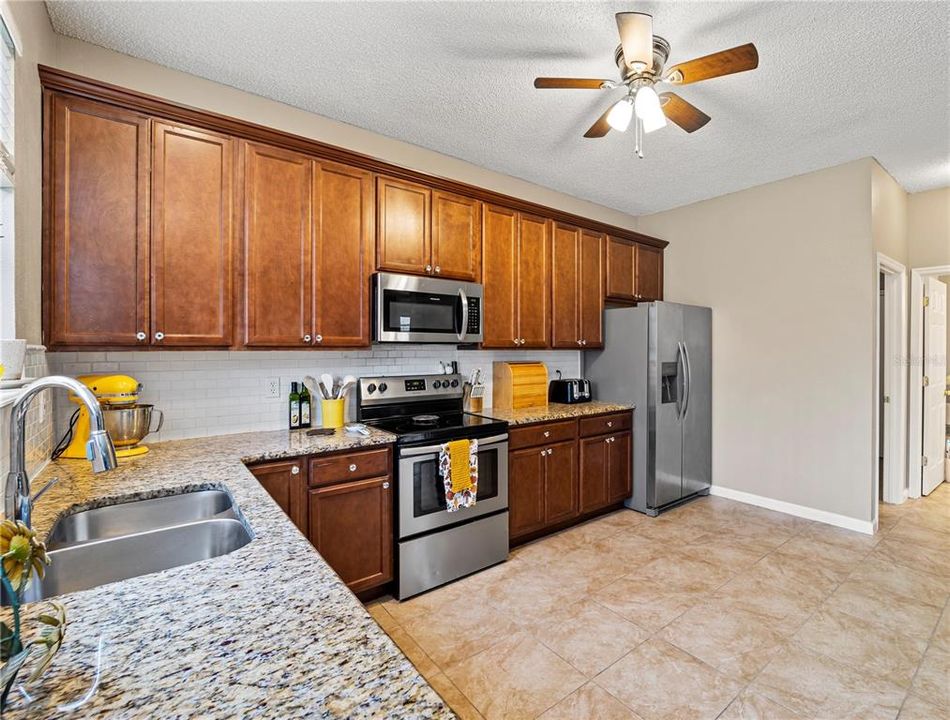 Granite Countertops and tile flooring.