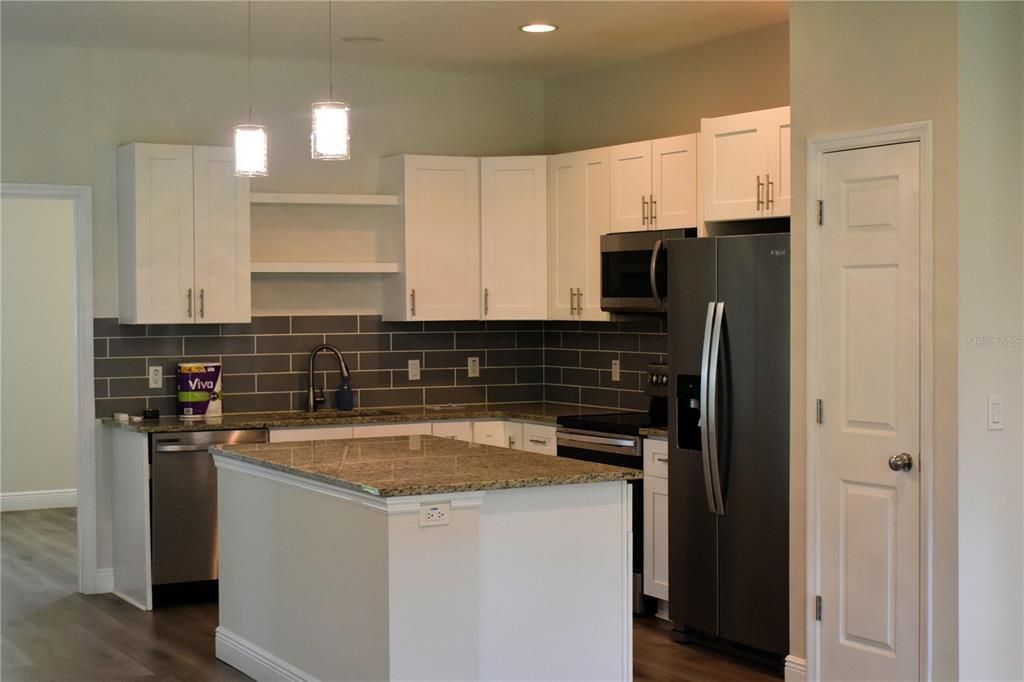 Well equipped kitchen with pantry